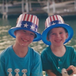 Two Young Boys Wearing Hats