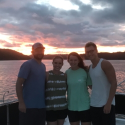 Group on a Boat at Sunset